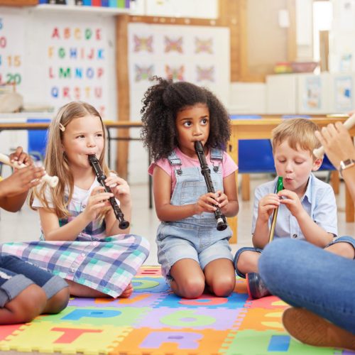 we-love-learning-about-musical-instruments-shot-children-learning-about-musical-instruments-class